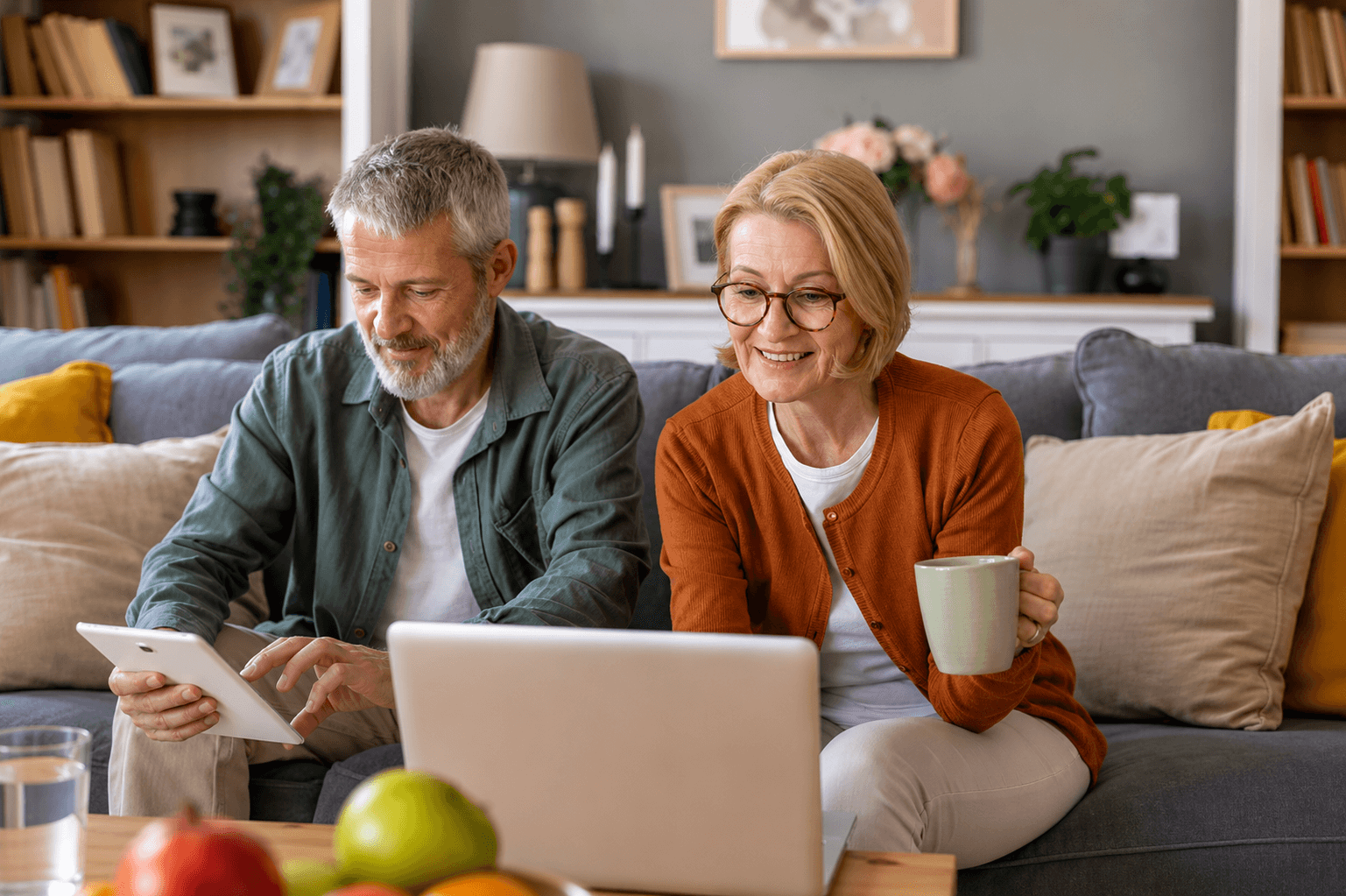 Senior couple reviewing pension information on a laptop